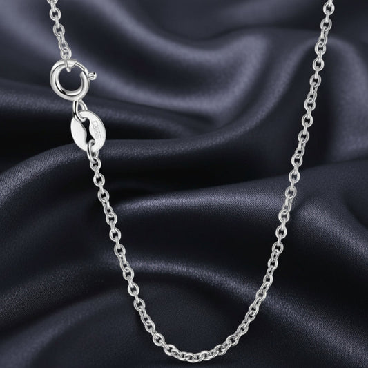 Silver chain necklace on a white background
