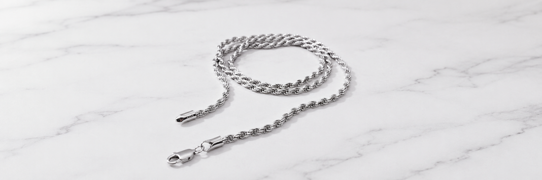 925 sterling silver rope chain necklace on a white marble surface - Jewel Radiance