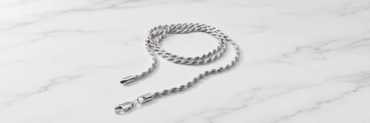 925 sterling silver rope chain necklace on a white marble surface - Jewel Radiance