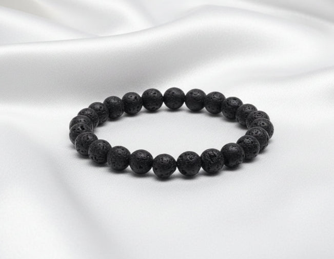 Black beaded bracelet on a white background