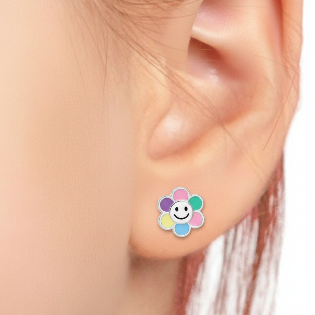 Child's ear with flower smiley studs