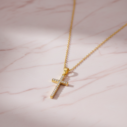 Cross pendant on pink marble