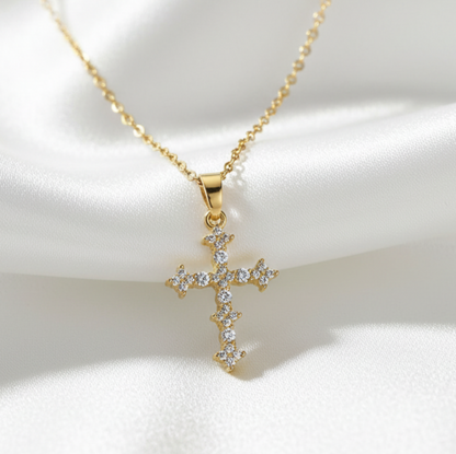 Cross pendant on white satin