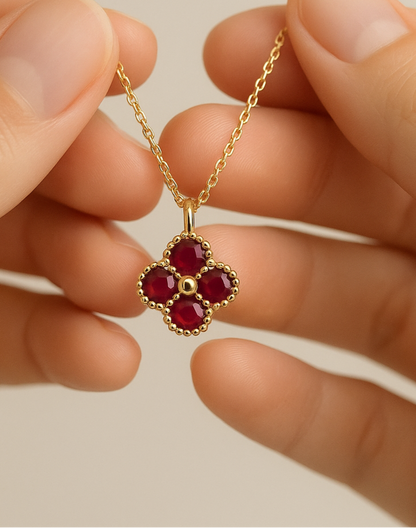 Hands Holding Clover Necklace