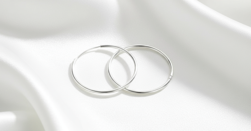 Hoop Earrings on White Silk