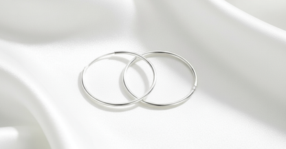 Hoop Earrings on White Silk