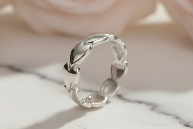 Silver ring on a marble surface