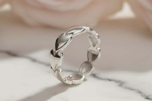 Silver ring on a marble surface