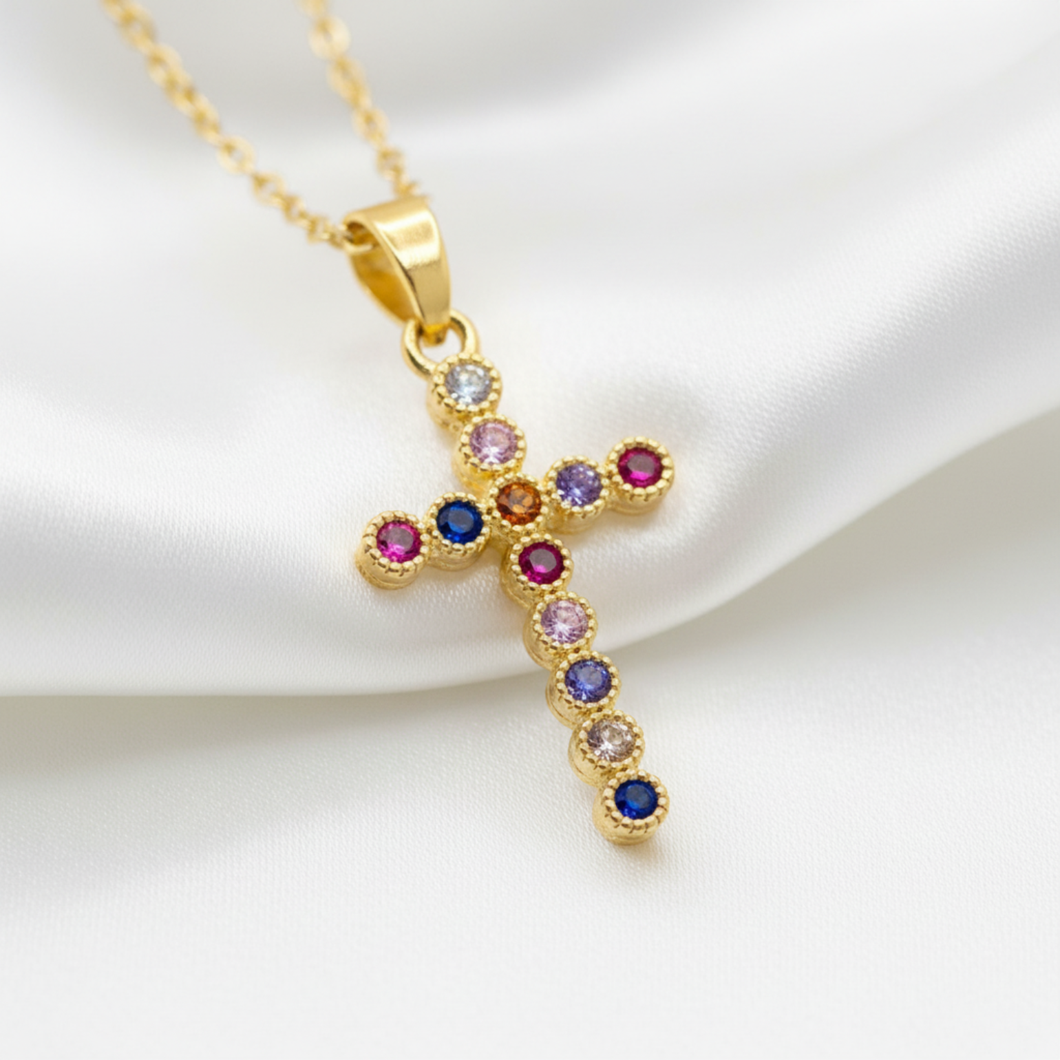 Multicolour cross on white satin