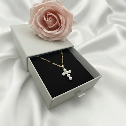 Pearl cross necklace - correct pearl arrangement in packaging