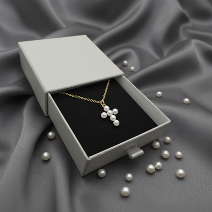 Pearl cross necklace - open drawer box with pearls
