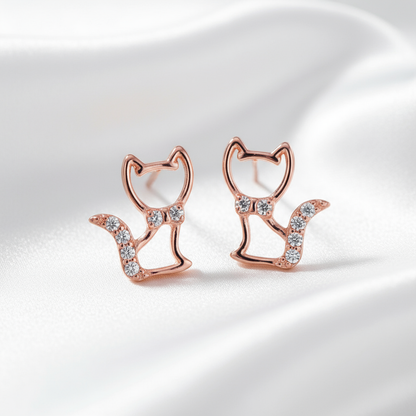 Rose Gold Cat Earrings on White Silk