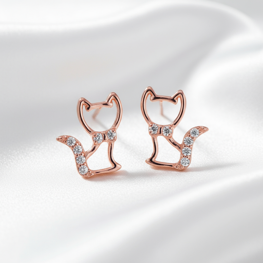 Rose Gold Cat Earrings on White Silk