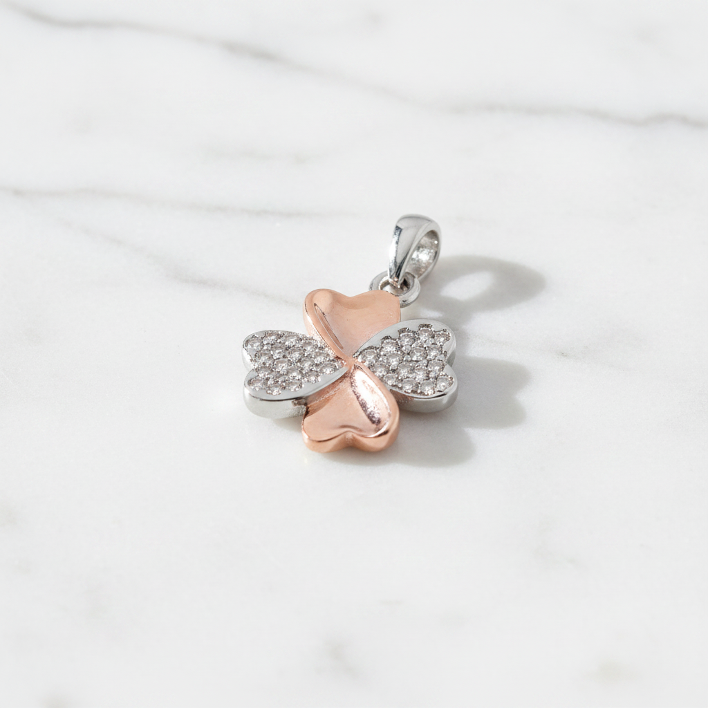 Product flat four leaf clover silver and rose gold pendant
